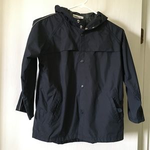 Splashy boy's dark blue rain coat. Size S(8)